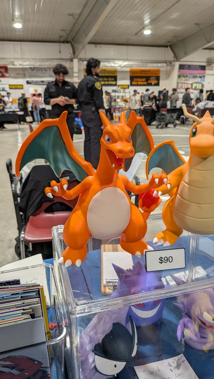 Display case of rare Pokémon cards at Hobbycon Winnipeg