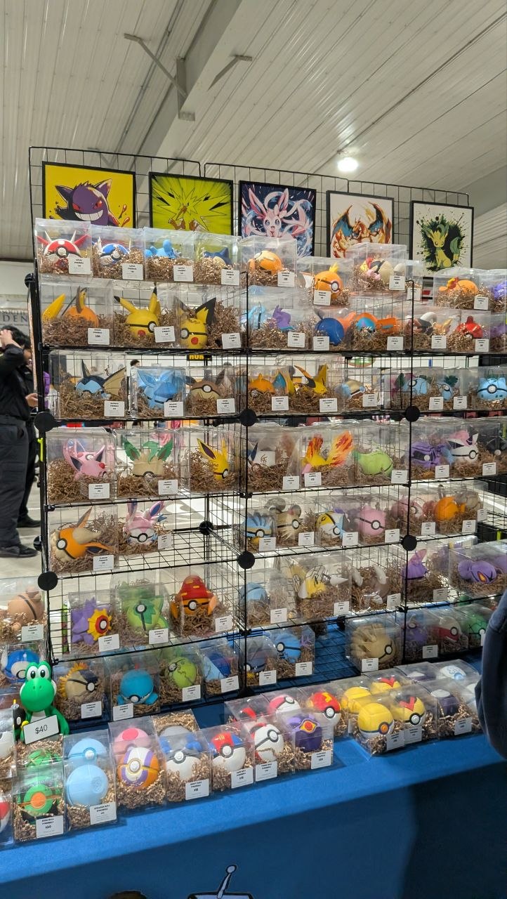 Close-up of rare Pokémon cards being evaluated by collectors